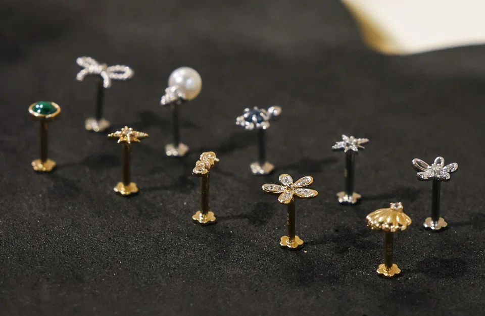 J&Co’s 14K solid gold flatback earrings in yellow and white gold.