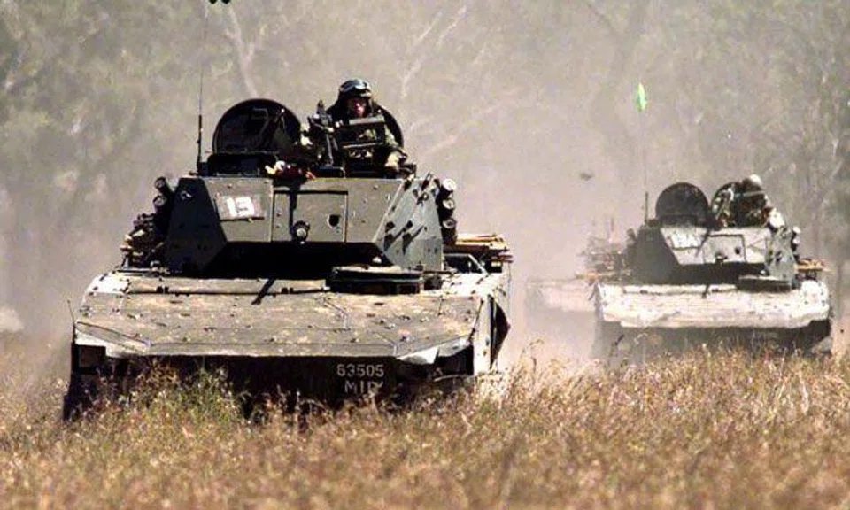 A file photo of a Bionix Infantry Fighting Vehicle. NSF Chan Hiang Cheng Gavin, 21, was travelling in a similar vehicle as part of Exercise Wallaby at the Shoalwater Bay Training Area in Australia when the vehicular incident took place on Sept 15, 2017.ST FILE PHOTO
