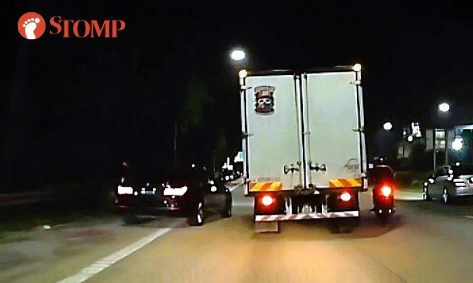 M'sian BMW driving out of road shoulder nearly causes accident with truck, motorcycle on BKE
