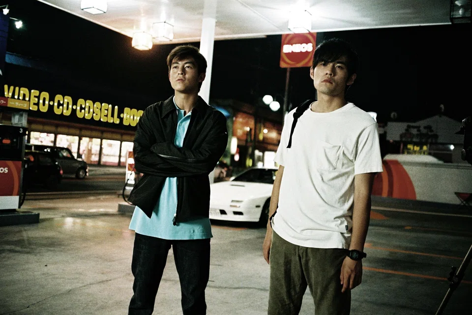 Edison Chen (left) and Jay Chou in Hong Kong street racing film Initial D (2005).