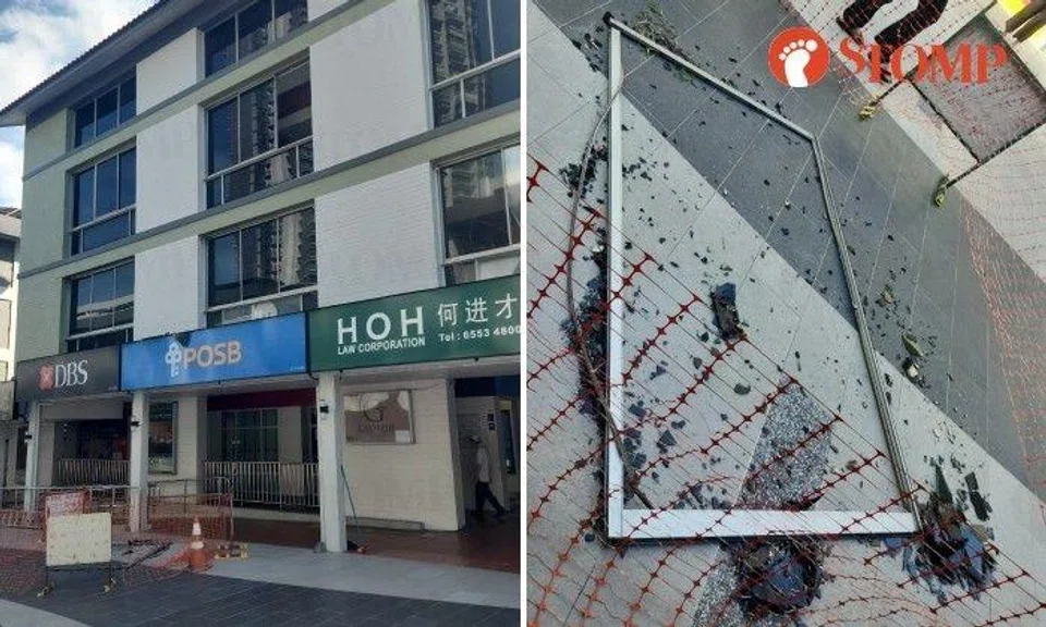 Stomper Bryan shared photos of the window frame and shattered glass on the ground as well as where it fell from.