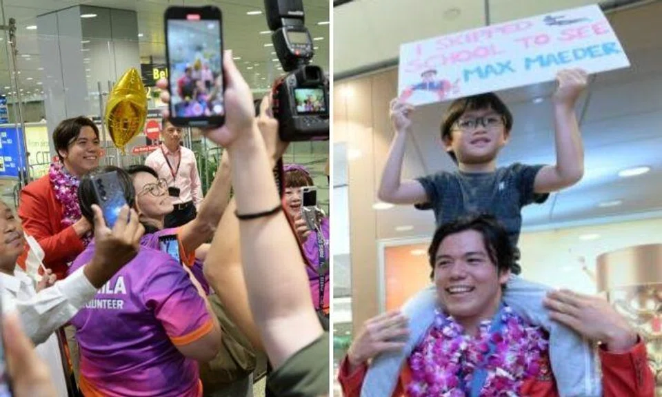 The arrival hall at Changi Airport Terminal 3 was busier than usual and crackled with anticipation before dawn on Aug 13 as Singapore welcomed its youngest Olympic medallist, kitefoiler Maximilian Maeder, back home. Photos: The Straits Times