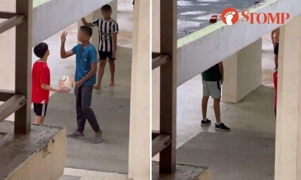 The Stomper shared photos of boys playing football at Block 582 Woodlands Drive 16.