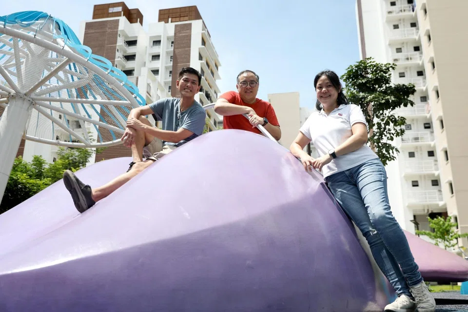Tengah residents (from left) Thomson Lim, Chris Loh and Audrey Leong at Tengah's Garden Vines playground. The trio had met through their BTO's Telegram group.