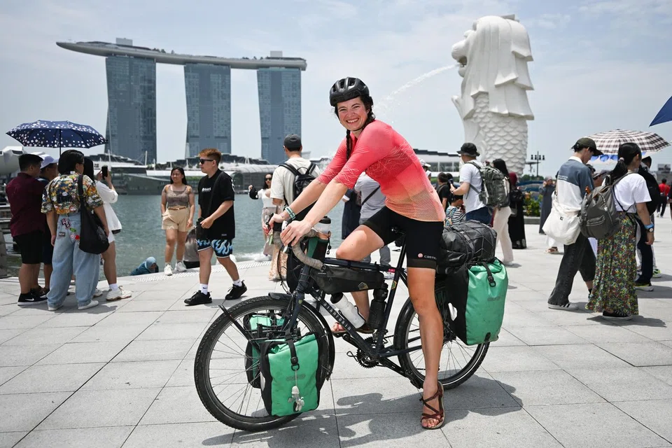 Ms Esme Hotston Moore at Merlion Park on March 31. She took about a year to cover the 25,000km distance across 28 countries from her home town in Somerset, England.