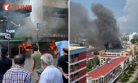 Fire engulfs Tampines coffee shop, workers escape as vents above them explode