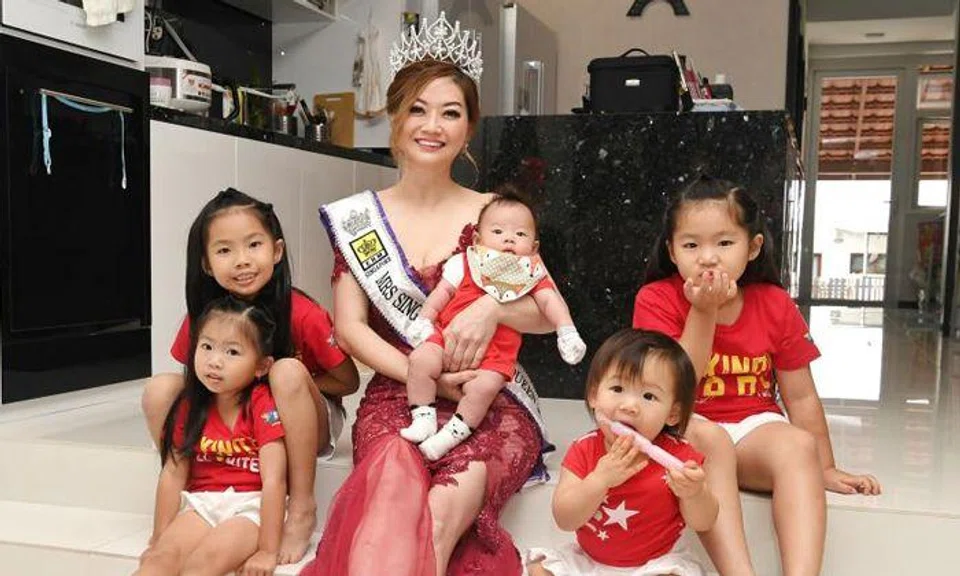 Ms Laura Lee and her grandchildren Fion Ng, Cara Ng, Shane Lian, Scarlett Lian and Celine Ng. TNP PHOTO: KHALID BABA
