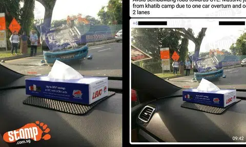 Massive jam stretches from Khatib Camp after car overturns in accident on Sembawang Rd 