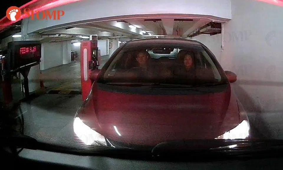 'Cheapskate' Honda Fit driver tailgates vehicle out of KKH carpark to avoid paying for parking