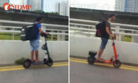 What's with these UberEATS guys risking their lives by riding e-scooters on road?