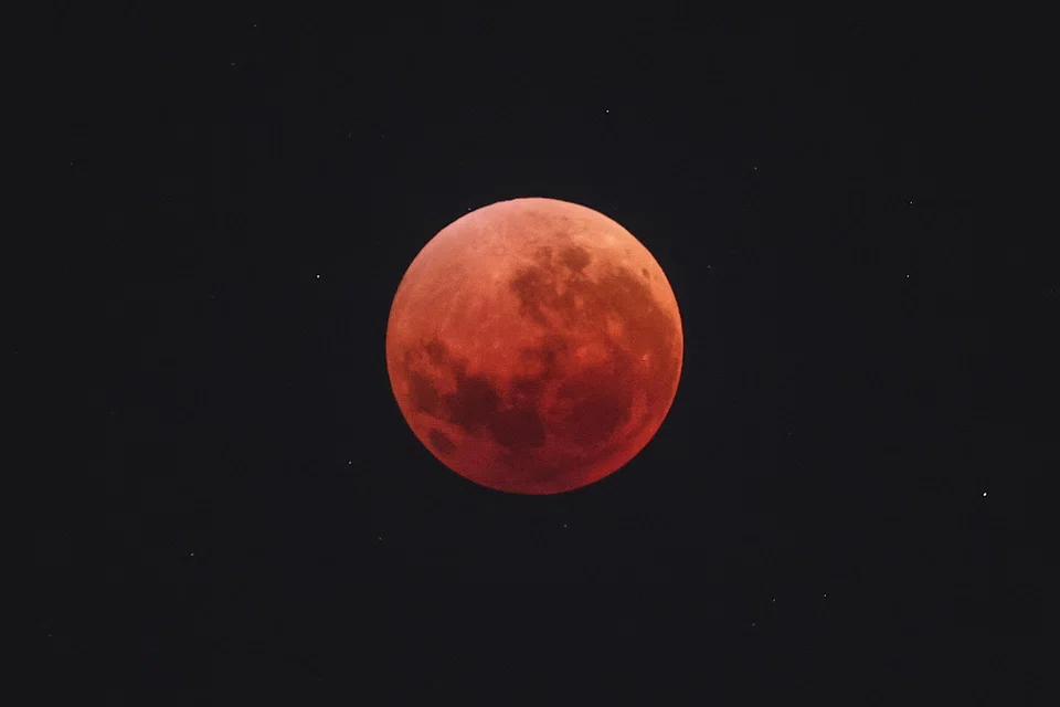 The blood moon in the night sky over Sydney on Sept 8.