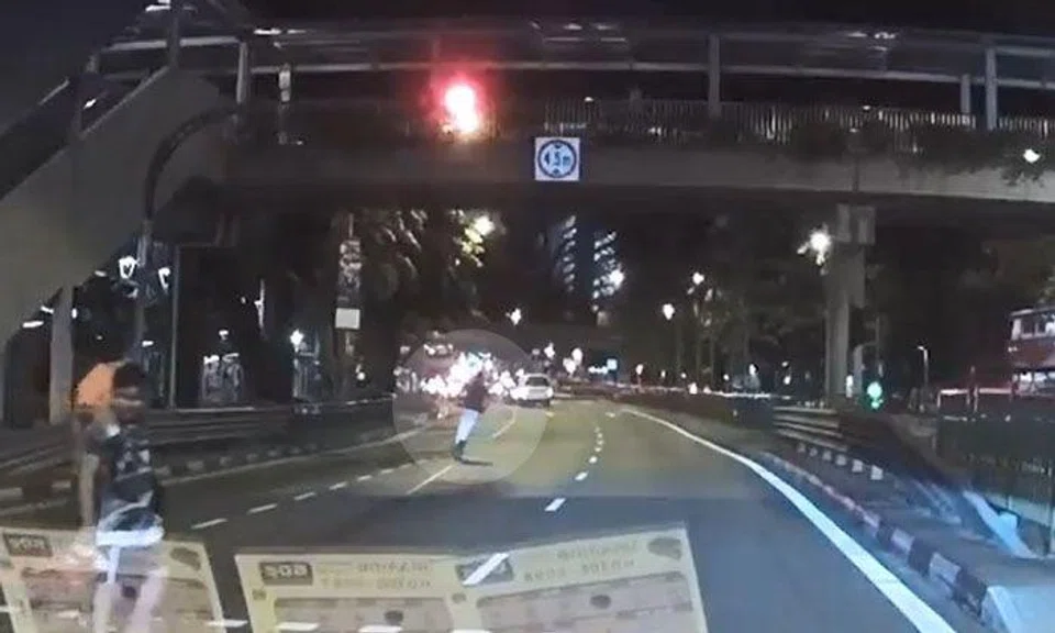 E-scooter rider leaves pedestrian stunned after speeding past red light outside AMK Hub