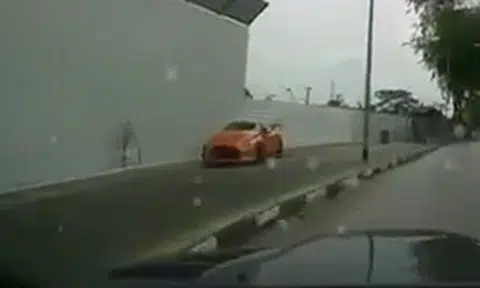 Nissan GT-R driver crashes into barrier after speeding off and losing control of car