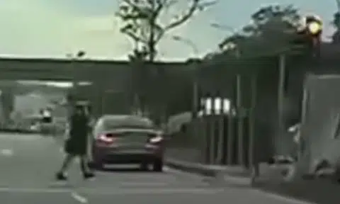 Pedestrian stunned after close shave with Mercedes that ran red light in Punggol