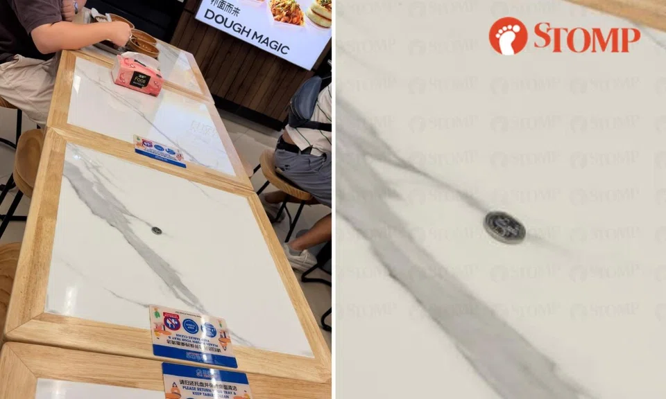 Someone used a 50-cent coin to "chope" a table at the Scarlett foodcourt 