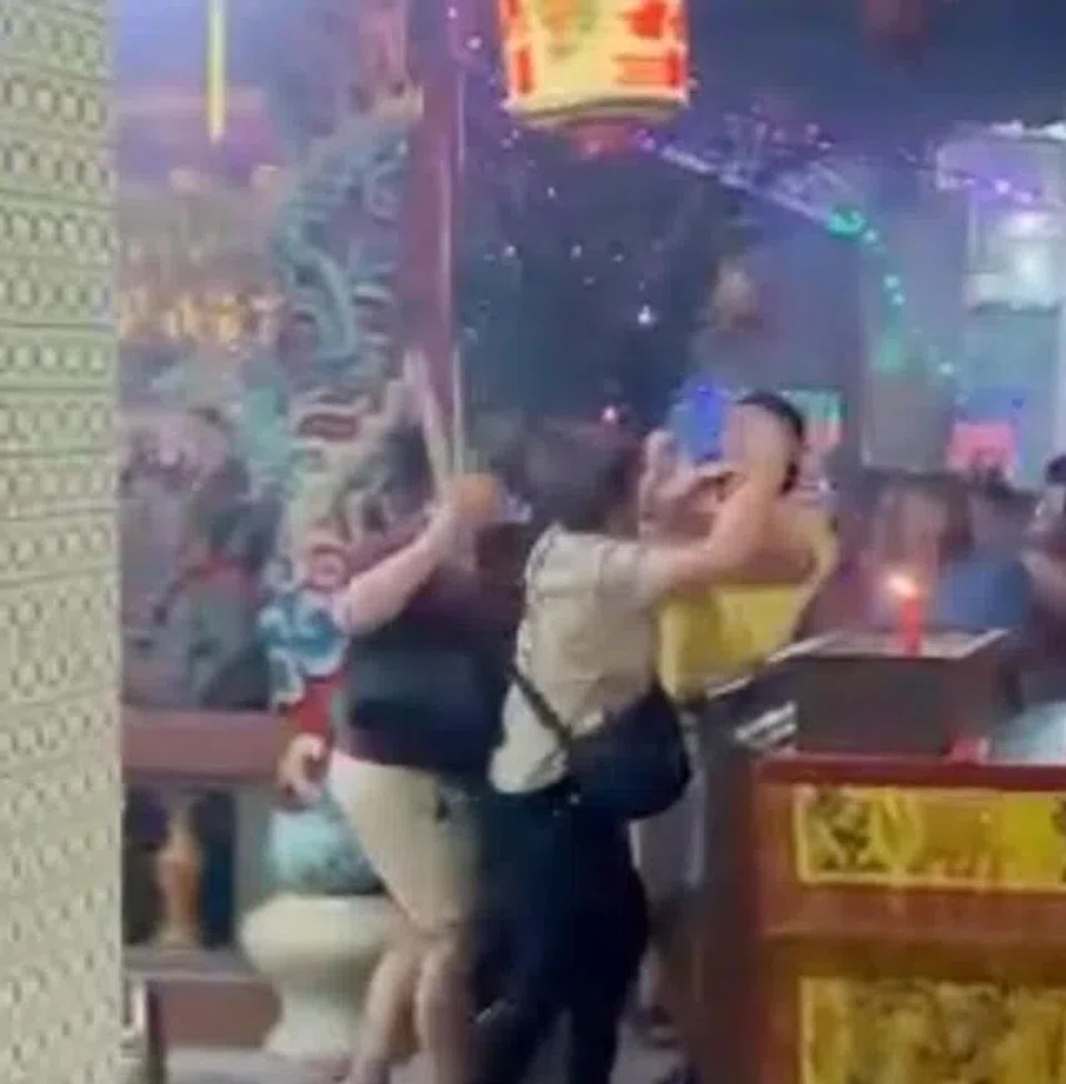 The three devotees who allegedly attacked a volunteer have offered to apologise in a newspaper.