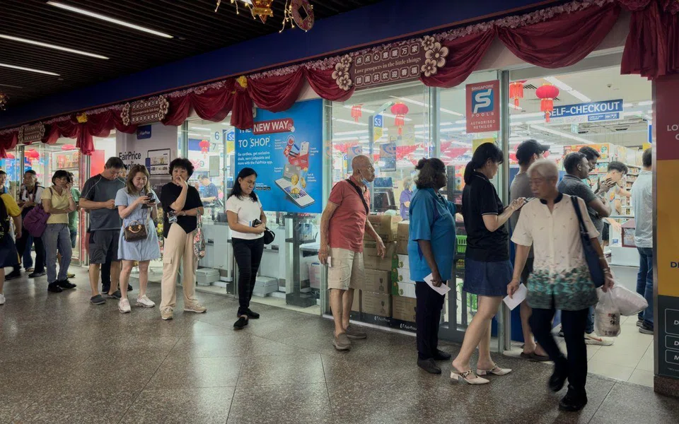 Twenty tickets won the Group 2 prize, which had a share amount of $73,408. ST PHOTO: GAVIN FOO