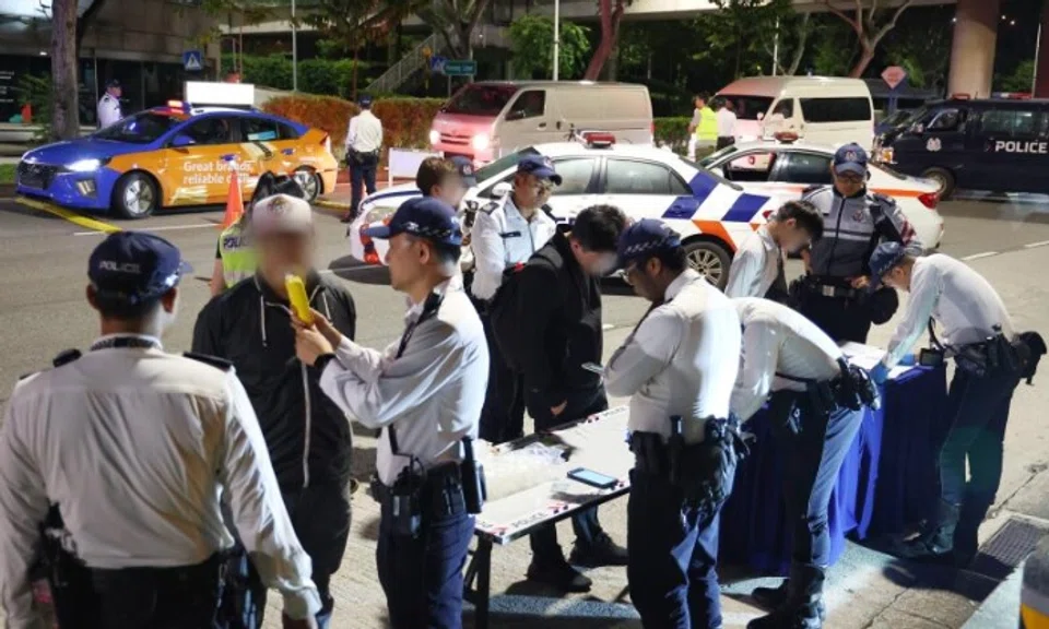 Fifty-six motorists were stopped and tested for alcohol consumption at various roadblocks. Photo: The Straits Times