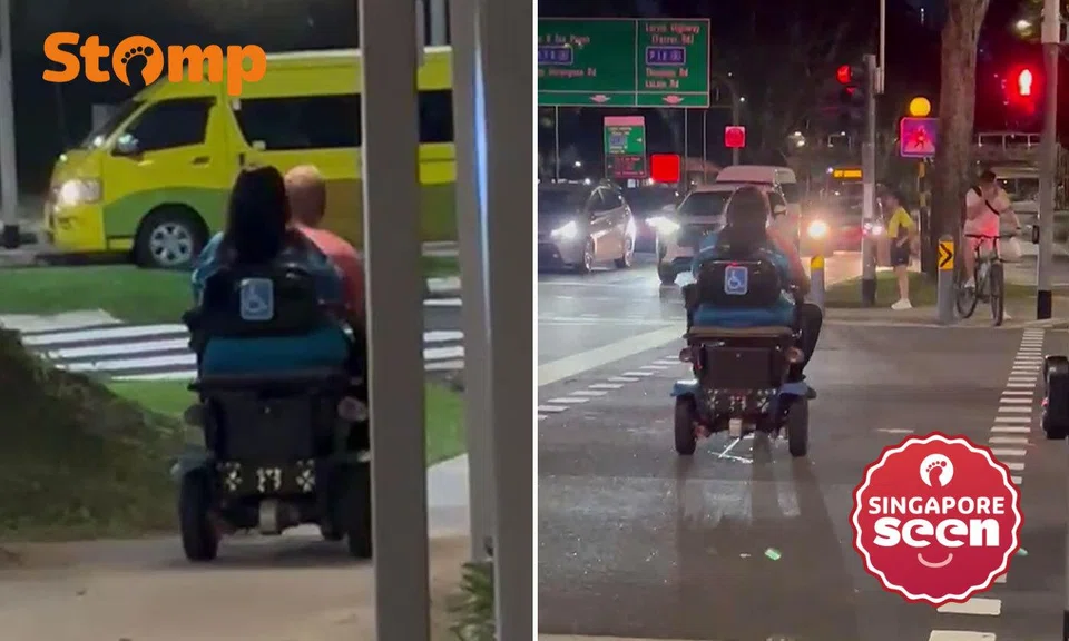 couple on mobility device speed and run red light in Bishan