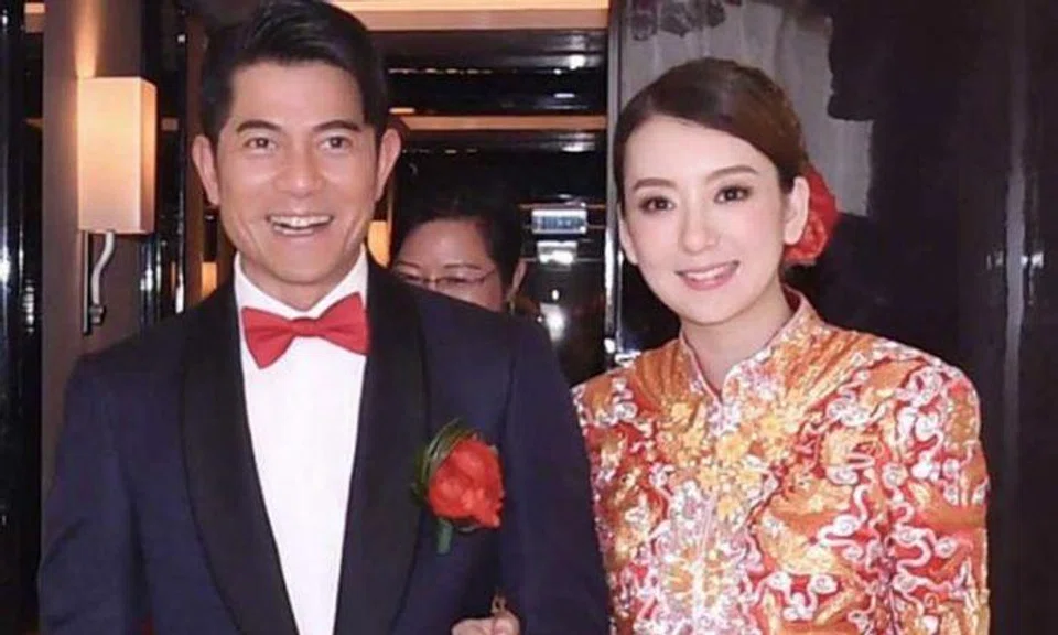 Newlywed Aaron Kwok plays coy around baby rumours
