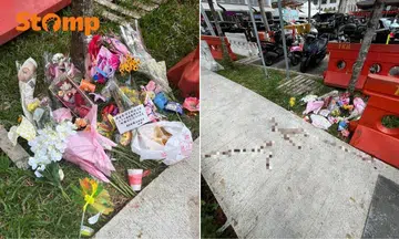 Flowers, food, and plush toys placed at site of Chinatown fatal crash