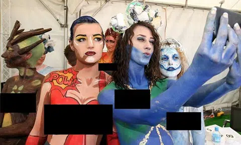 Women attend New Zealand's horse racing event in nothing but body paint