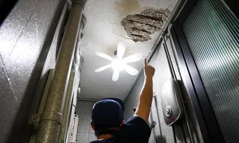 Woman narrowly escapes injury after toilet ceiling collapses in 58-year-old Queenstown flat