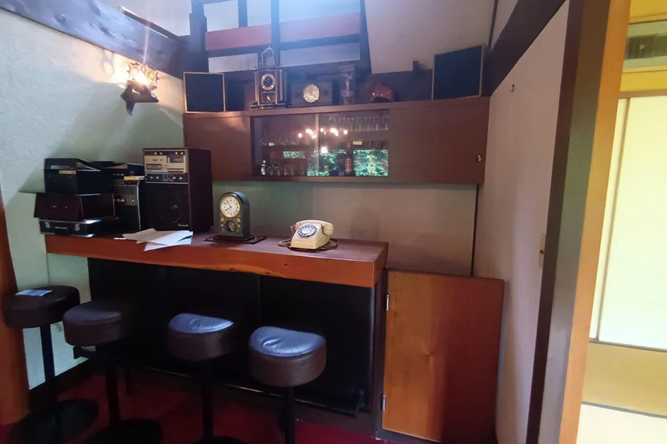 Many of the features of the house, like a bar, were made for entertaining guests.