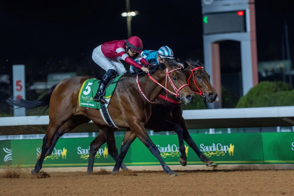 Forever Young (Ryusei Sakai, No. 5) edges out Romantic Warrior (James McDonald) to claim the Group 1 Saudi Cup (1,800m) at the King Abdulaziz Racecourse on Feb 22.