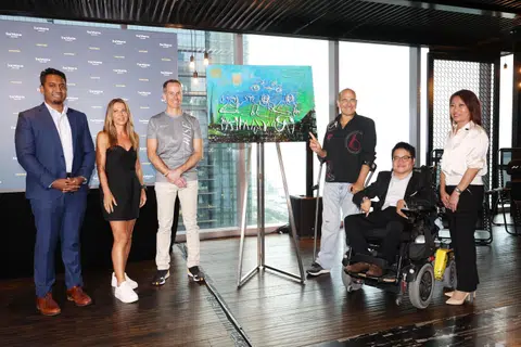 (From left) Santoz Kumar, Ironman Group's general manager for Singapore; Westin Singapore ambassador Natalie Dau; Westin Singapore general manager James Walkden; Westin Singapore ambassador Gregory Burns; Singapore Disability Sports Council committee...