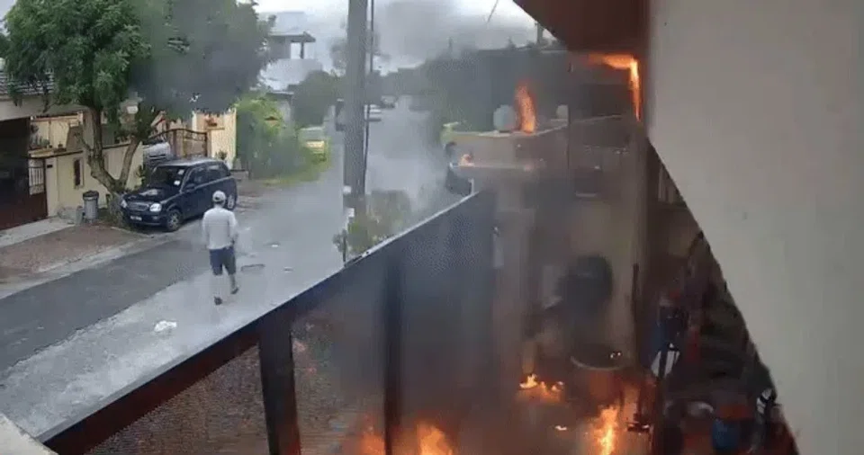 The man set the house on fire and recorded the scene while walking away.