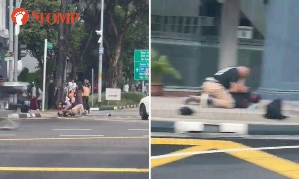 Two men were caught on camera fighting at the junction of Geylang Road and Paya Lebar Road on Nov 26.