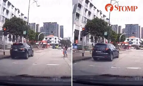 Not 1 but 2 cars run red light at Katong pedestrian crossing, first one almost hits woman with 2 kids