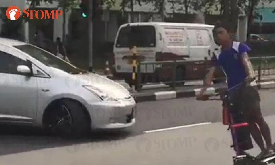 An e-scooter rider was caught on camera weaving in and out of traffic dangerously