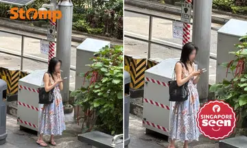 Woman smokes openly outside Lucky Plaza despite NEA CCTV camera nearby