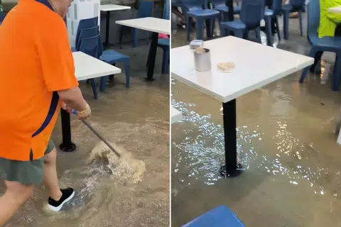 Yishun coffee shop sees ankle-deep floodwaters after downpour on 13 April
