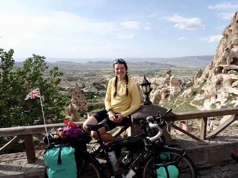 Ms Hotston Moore with her bicycle in Cappadocia, Turkey.