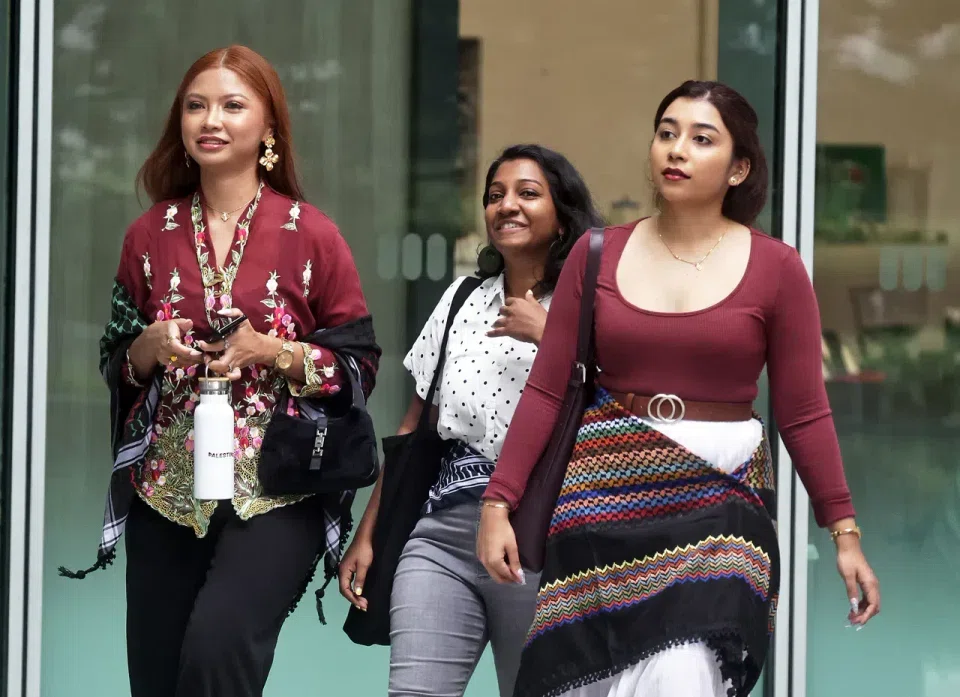 (From left) Ms Siti Amirah Mohamed Asrori, Ms Annamalai Kokila Parvathi and Ms Mossammad Sobikun Nahar arriving at the State Courts on July 2.