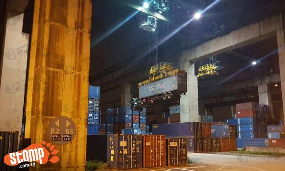 PSA responds to Stomp query about huge container truck being hoisted up ...