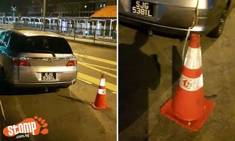 Newspaper delivery driver has special 'HDB cone' to park at bus stop?