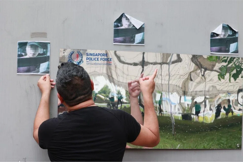 The 13th-floor resident said that his neighbour had put up photos of his son in the HDB estate.