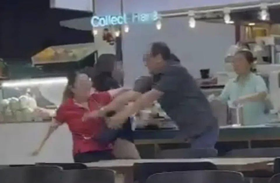 Patrons tried to stop the fight between the two beer promoters.