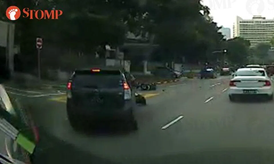 Car cuts across 4 lanes and collides into motorcycle along Kim Seng Road