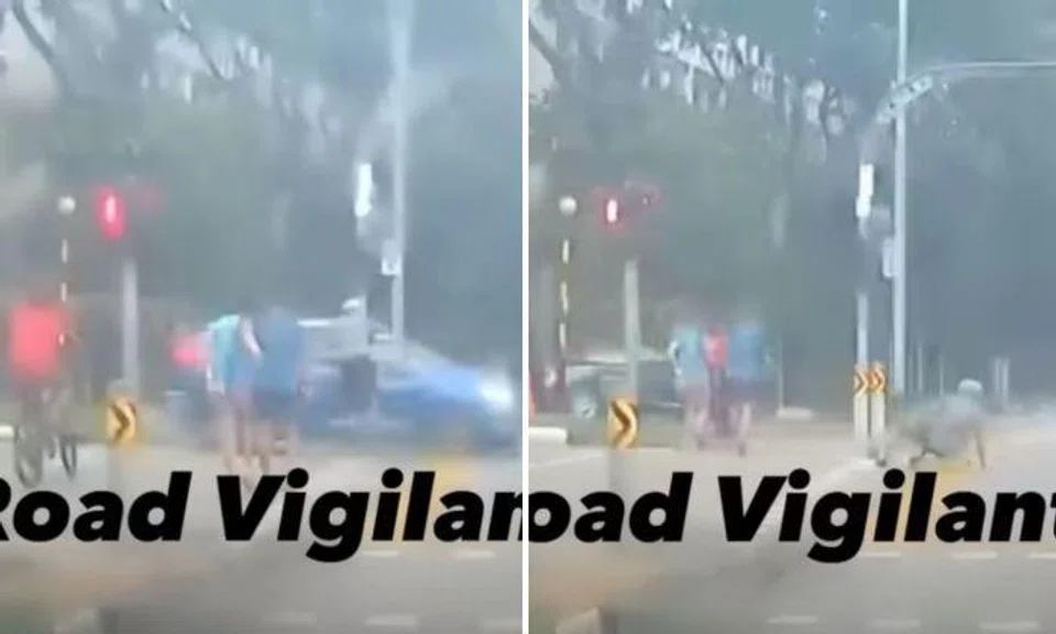 A video posted on Facebook group SG Road Vigilante showed three pedestrians and a cyclist crossing the road while the traffic light was not in their favour at Compassvale Crescent amid a heavy downpour. 