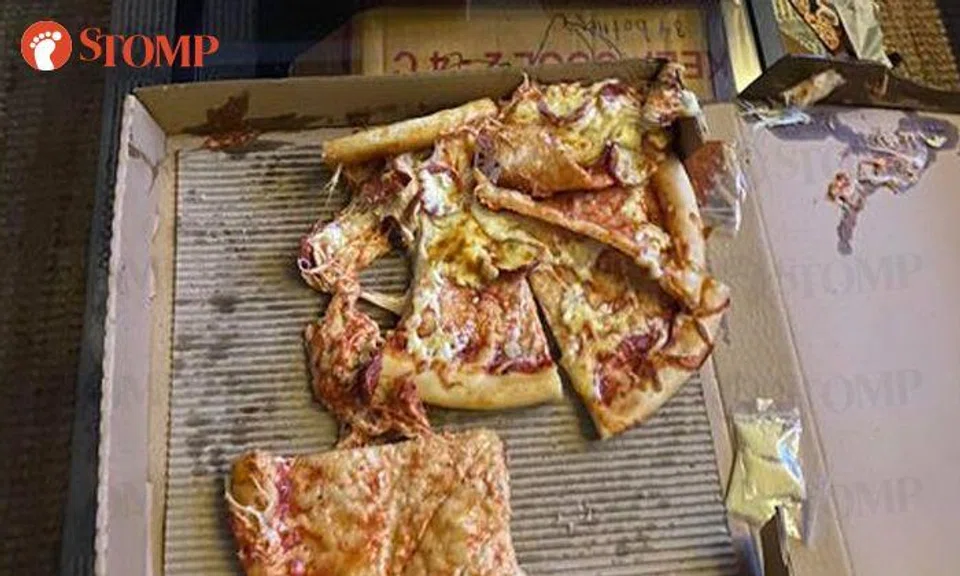 Customer loses appetite after receiving pizzas that look 'completely destroyed'