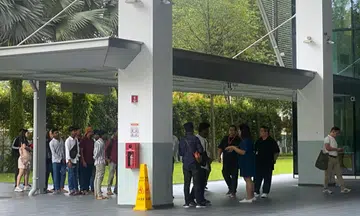 The migrant workers were met by ministry officials at the MOM Services Centre in Bendemeer and escorted into the building.