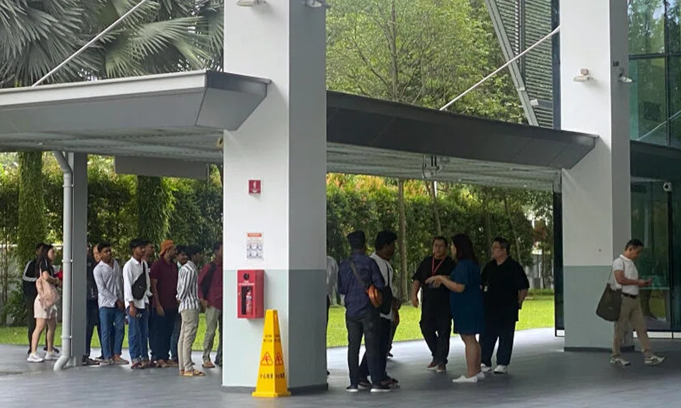 The migrant workers were met by ministry officials at the MOM Services Centre in Bendemeer and escorted into the building.