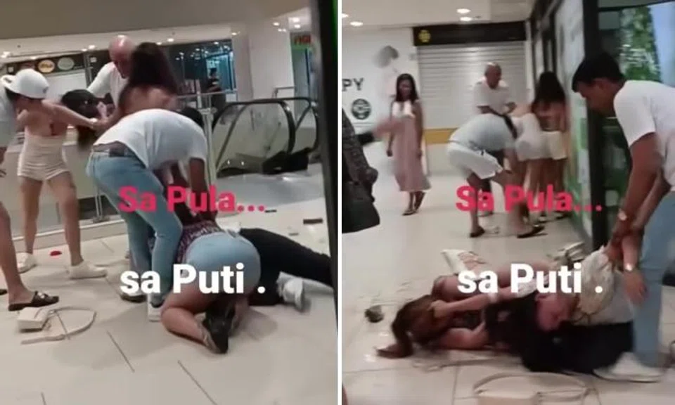 Women punch, kick and pull each others' hair in Lucky Plaza brawl as men try to break up fight