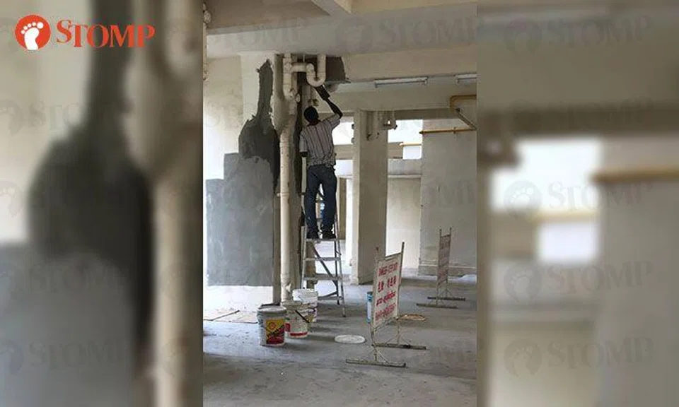 Cracked walls with corroded steel bars at AMK Avenue 4 block repaired by contractor