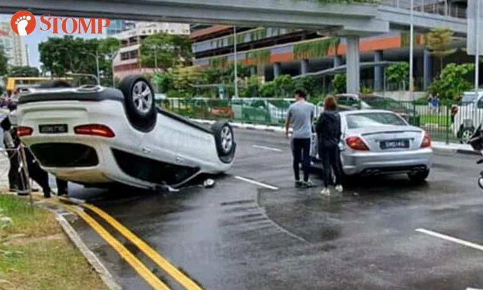 Car turns turtle after accident with another vehicle at Sims Avenue junction
